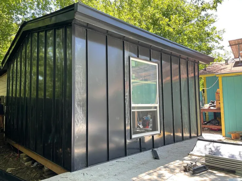 Black standing seam metal wall panels for Metal Roof Installation in Goshen